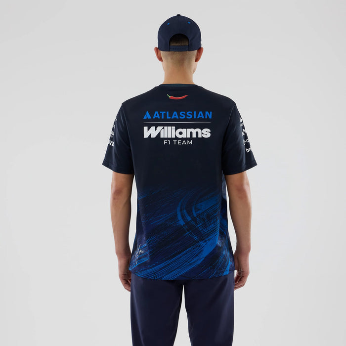 The model is wearing this Carlos Sainz Atlassian Williams F1 Team Tech T-shirt in navy. 2