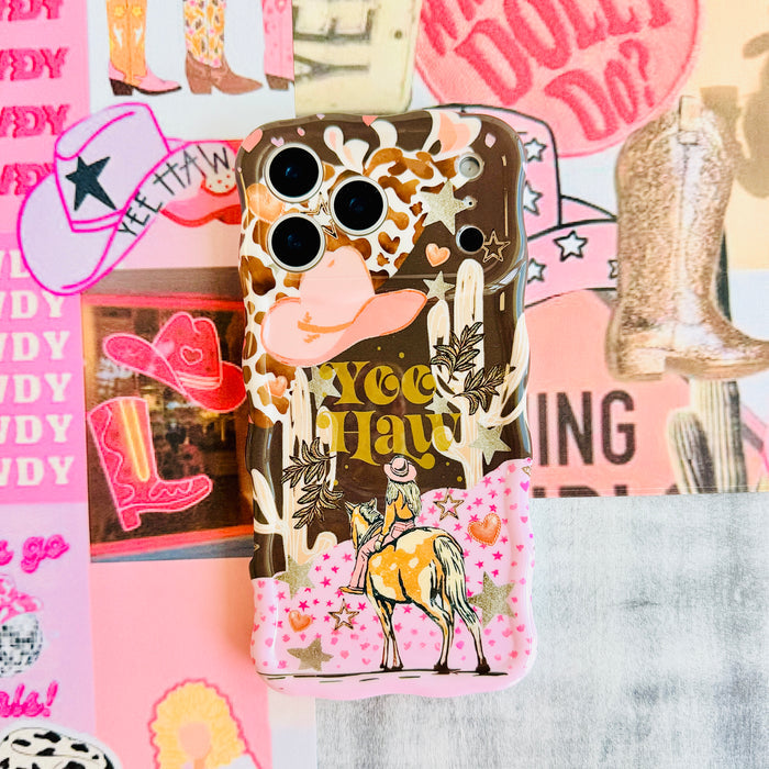 Yee Haw Honey Wavy Luxe MagSafe iPhone case styled on a pink Howdy and cowboy boot moodboard backdrop.